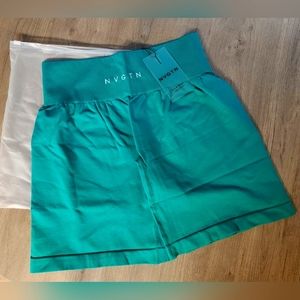 NVGTN high waisted teal shorts size M